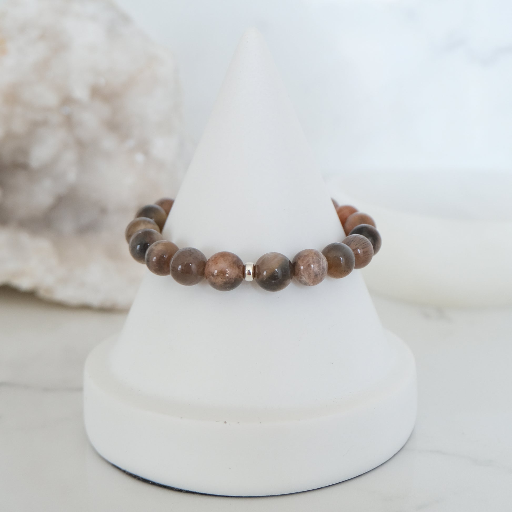 Black moonstone and sunstone gemstone bracelet with silver accessories