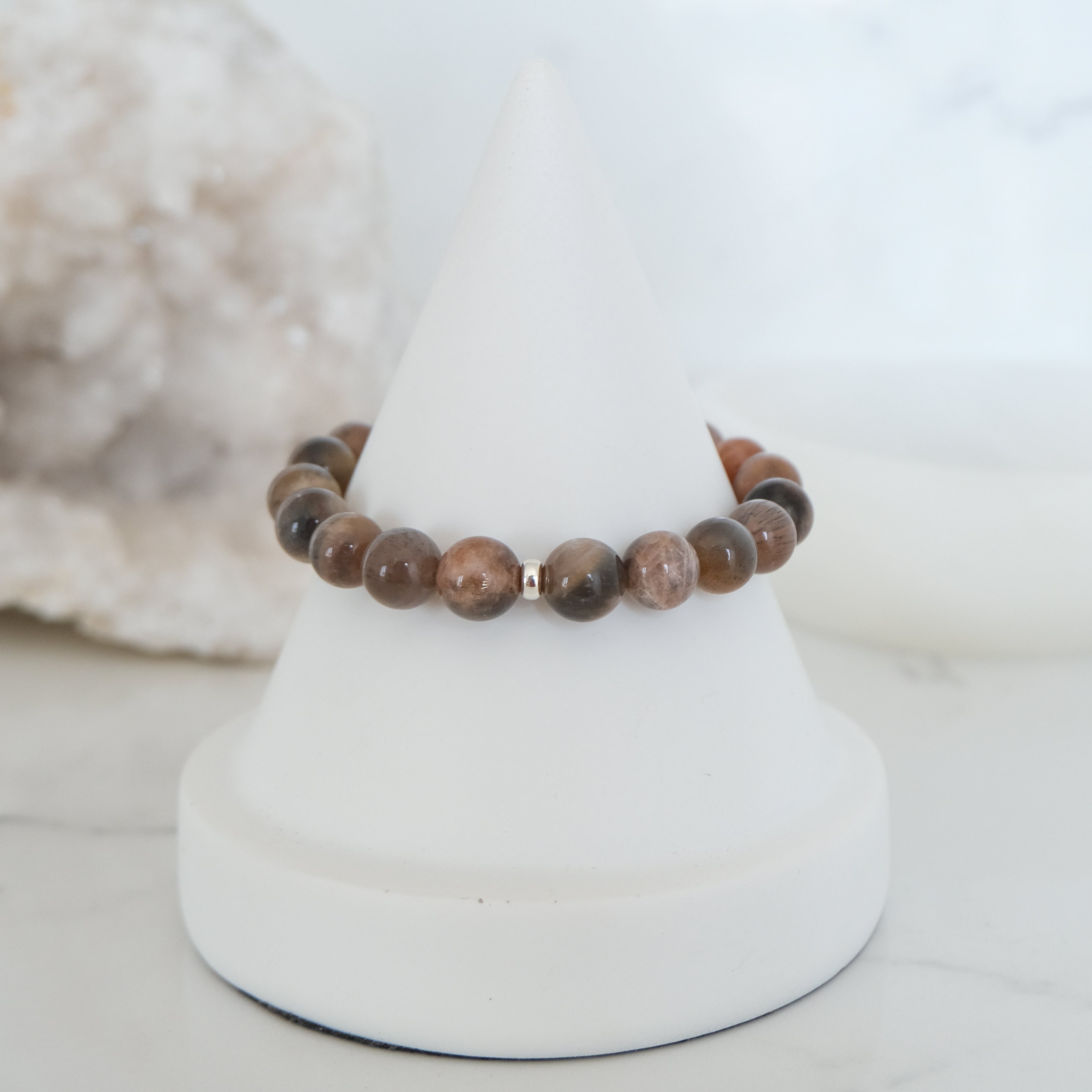 Black moonstone and sunstone gemstone bracelet with silver accessories
