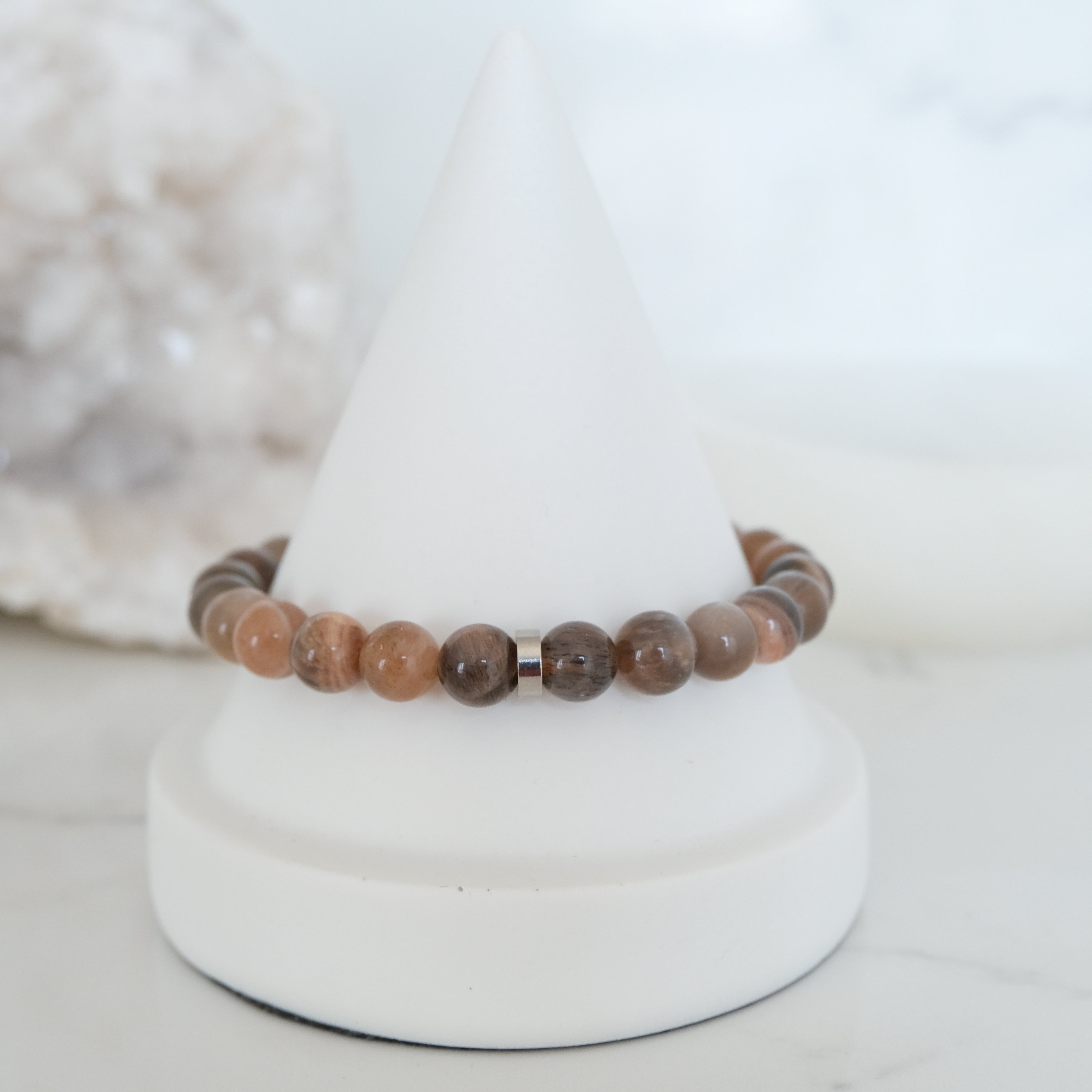 Black moonstone and sunstone gemstone bracelet with steel accessories