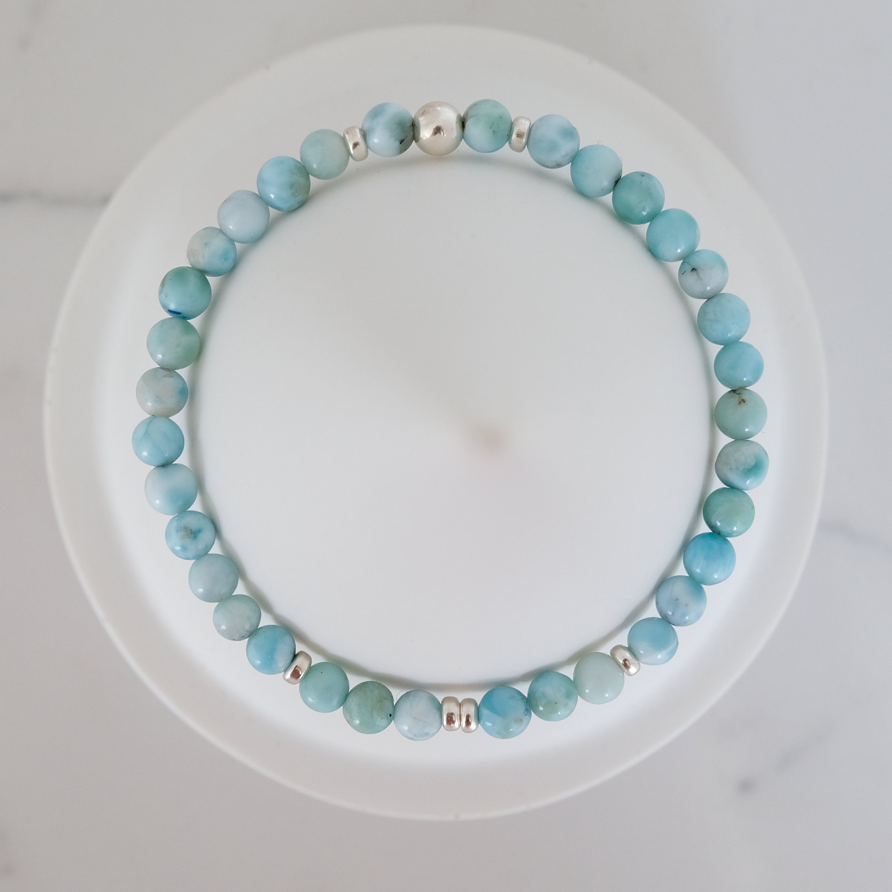4mm larimar gemstone bracelet with silver accessories from above