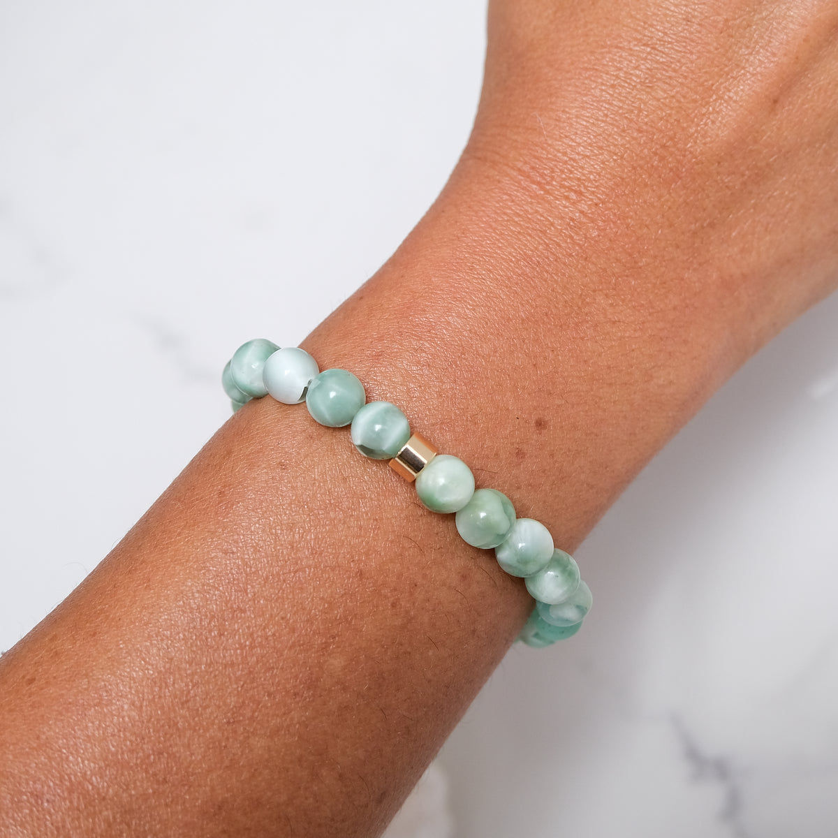 green moonstone sample sale bracelet worn on a model's wrist