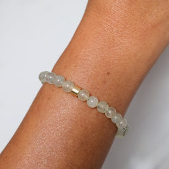 Prehnite sample sale bracelet worn on a model's wrist