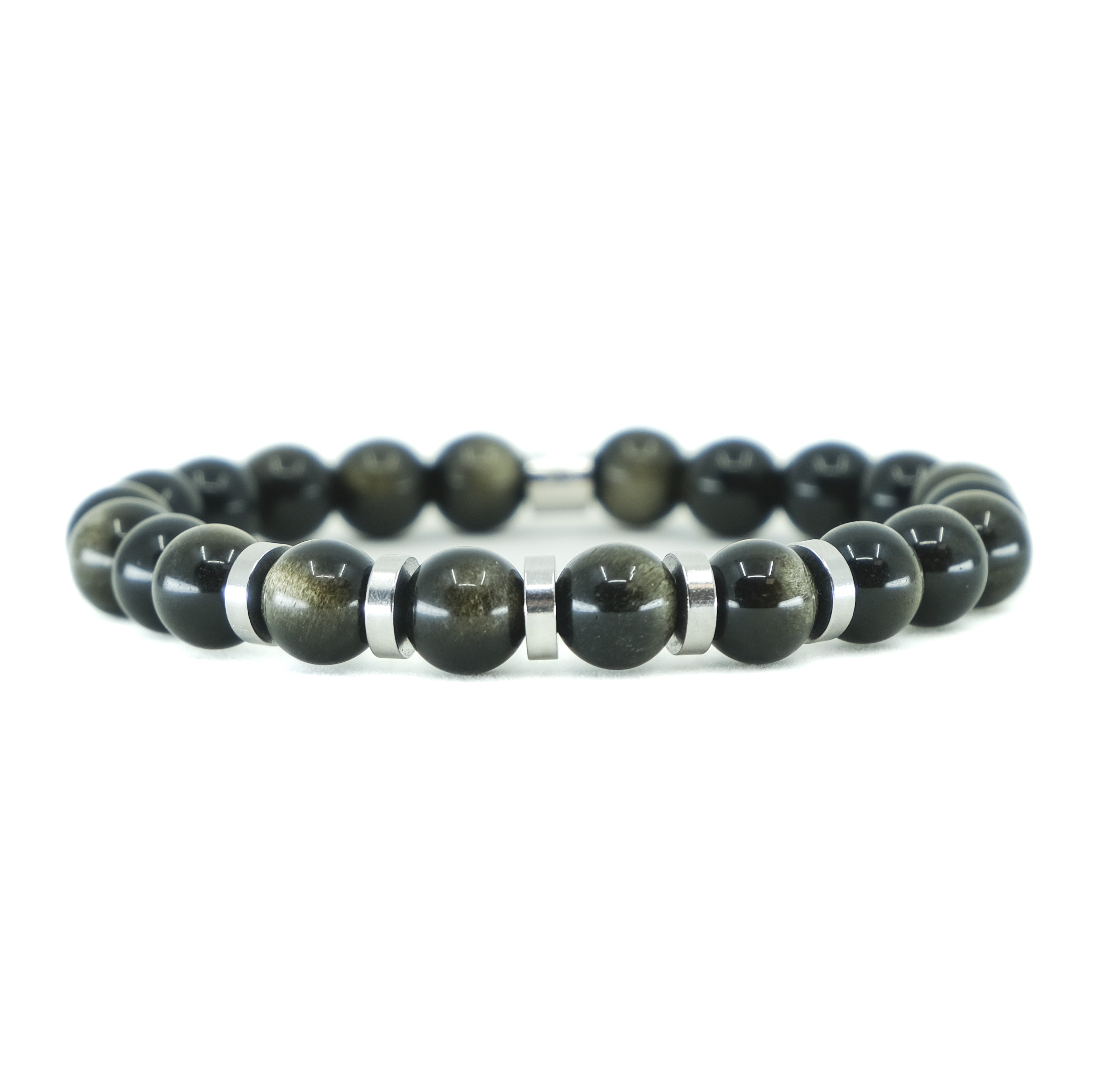 A golden obsidian gemstone bracelet with stainless steel accessories