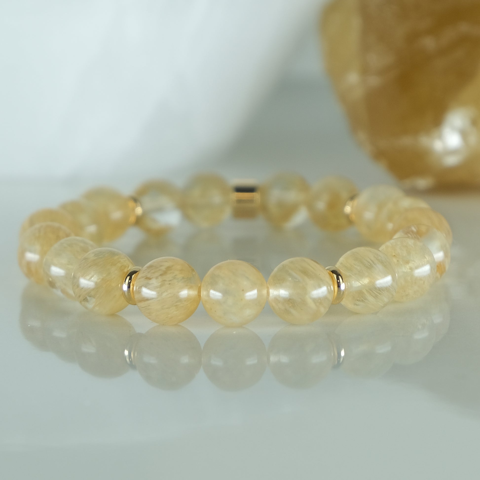 8mm golden healer quartz gemstone bracelet with gold plated accents