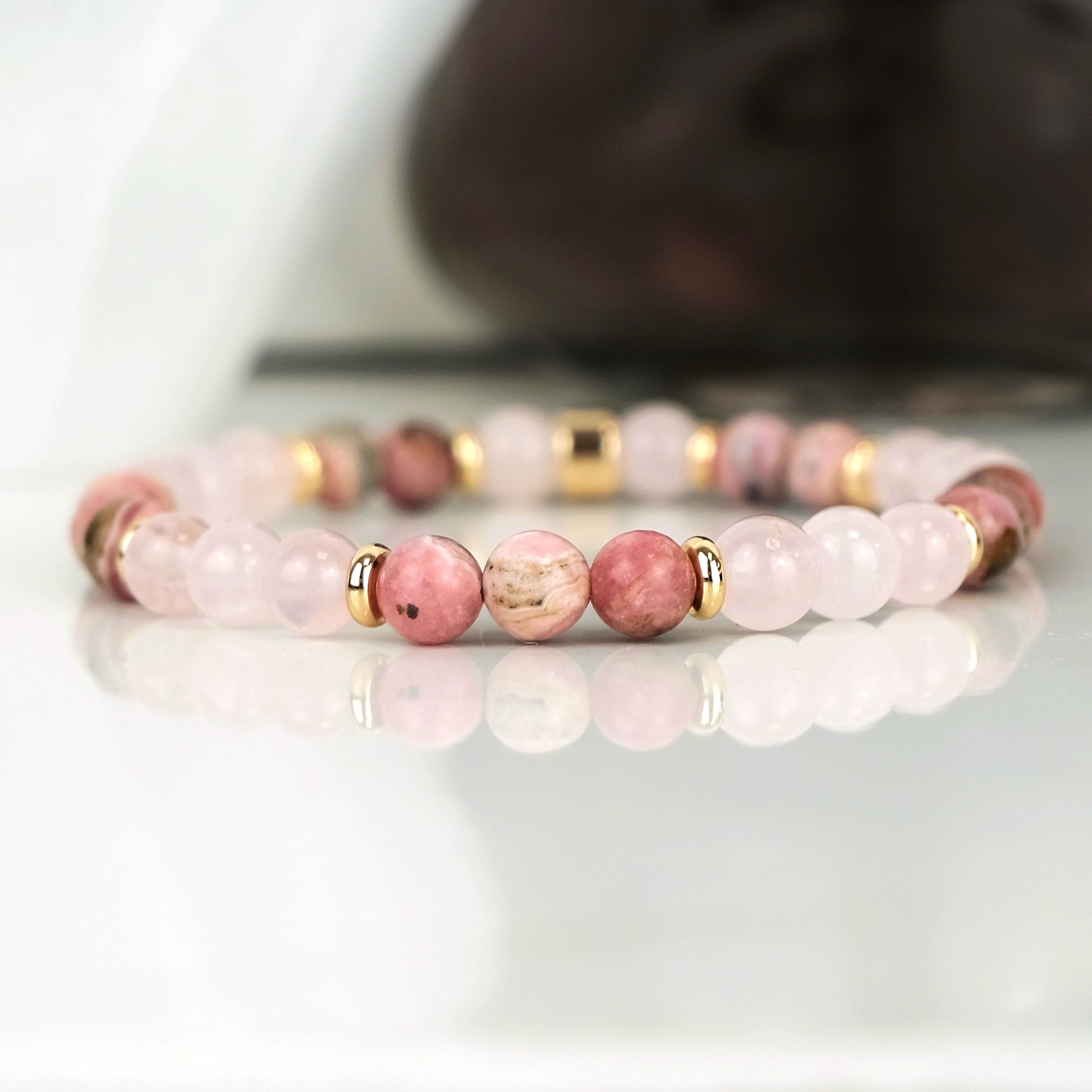 Rhodonite and rose quartz gemstone bracelet in 6mm beads with gold accessories