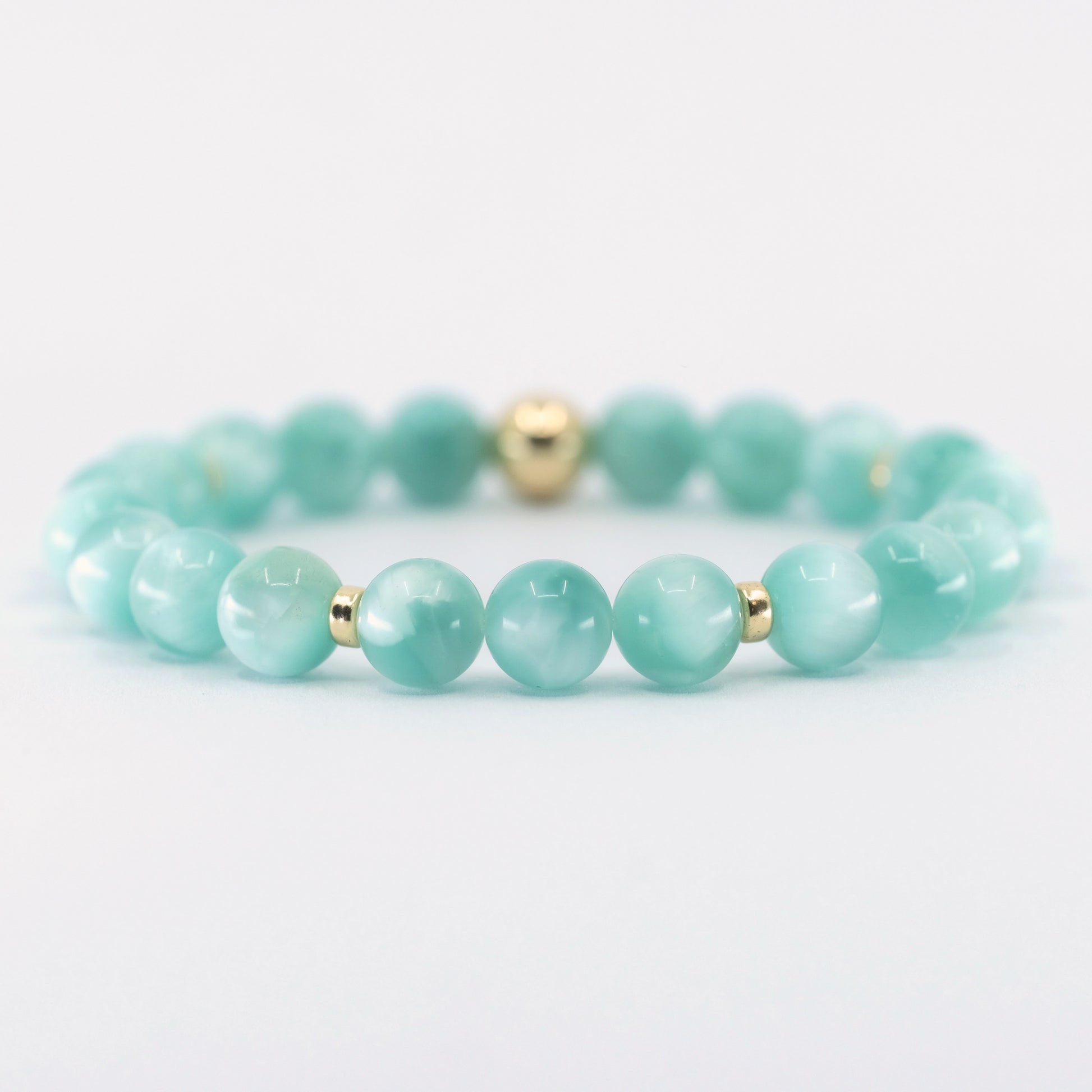 Green Moonstone gemstone with gold accents