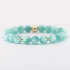 Green Moonstone gemstone with gold accents