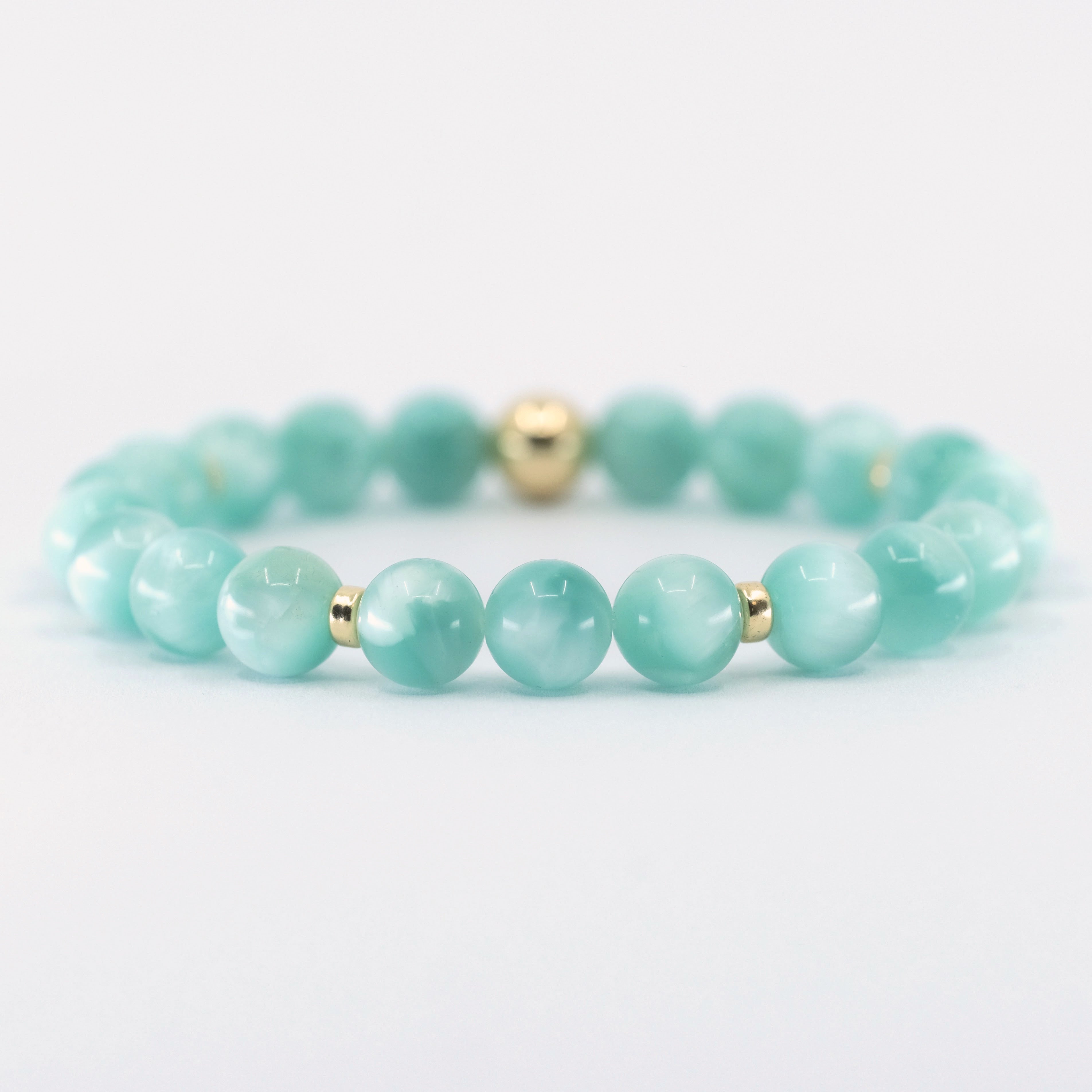 Green Moonstone gemstone with gold accents