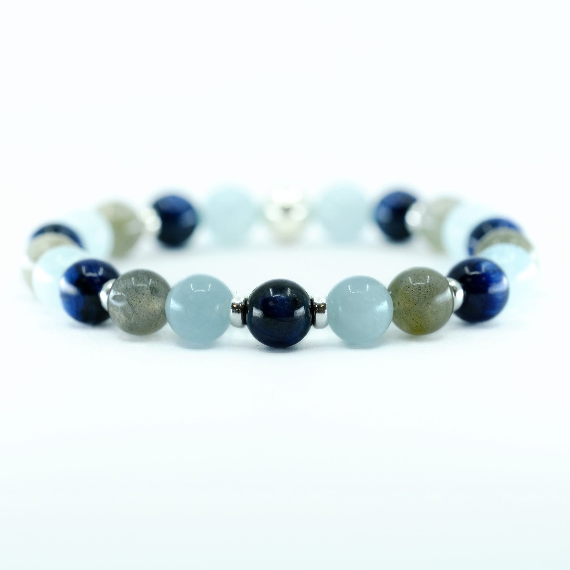 A Kyanite, Aquamarine and Labradorite gemstone bracelet with silver accessories 