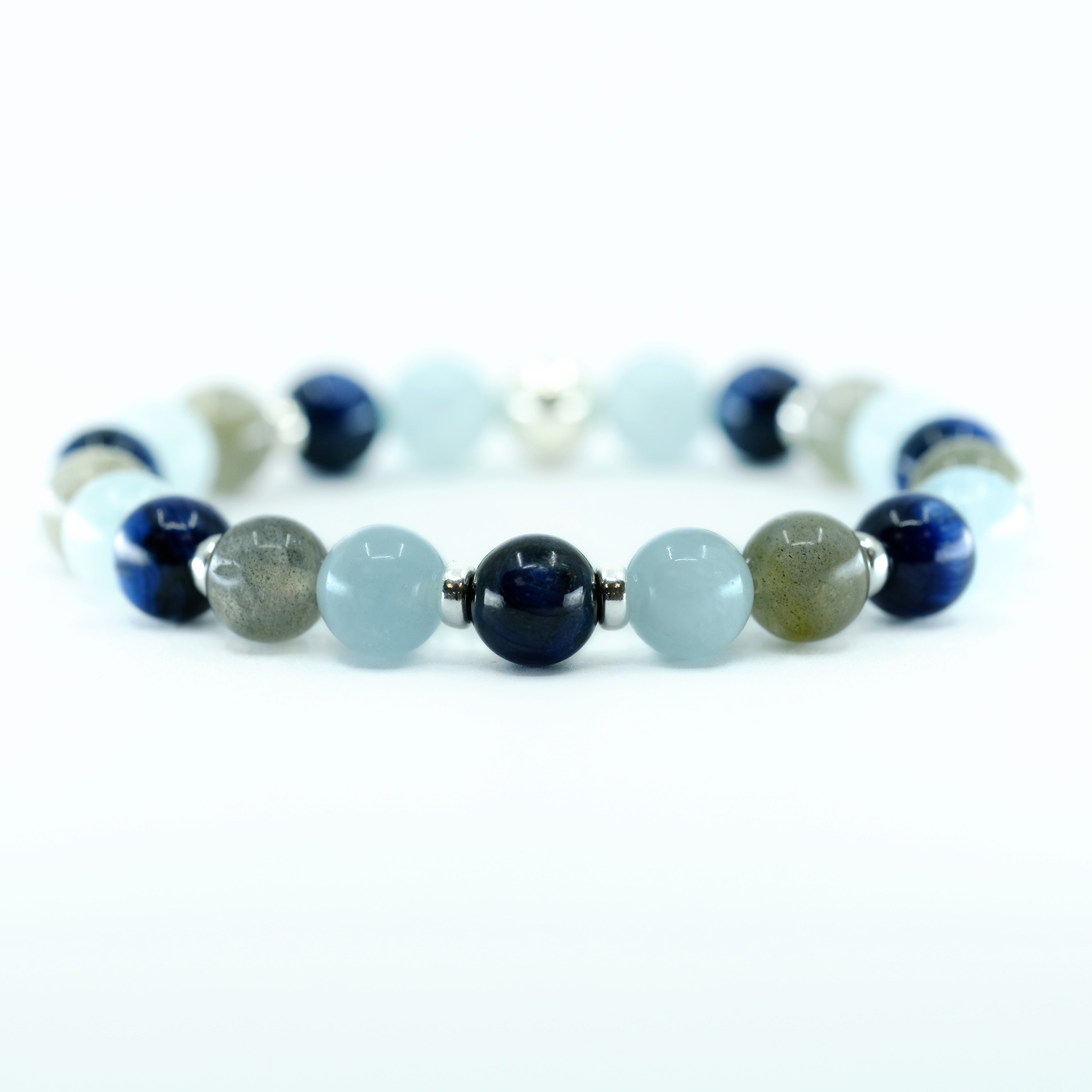 A Kyanite, Aquamarine and Labradorite gemstone bracelet with silver accessories 