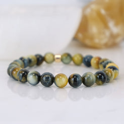 Dream tiger eye gemstone bracelet with gold accessory