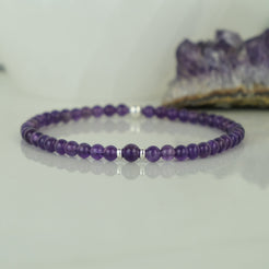 Amethyst gemstone bracelet in 4mm beads with silver accessories