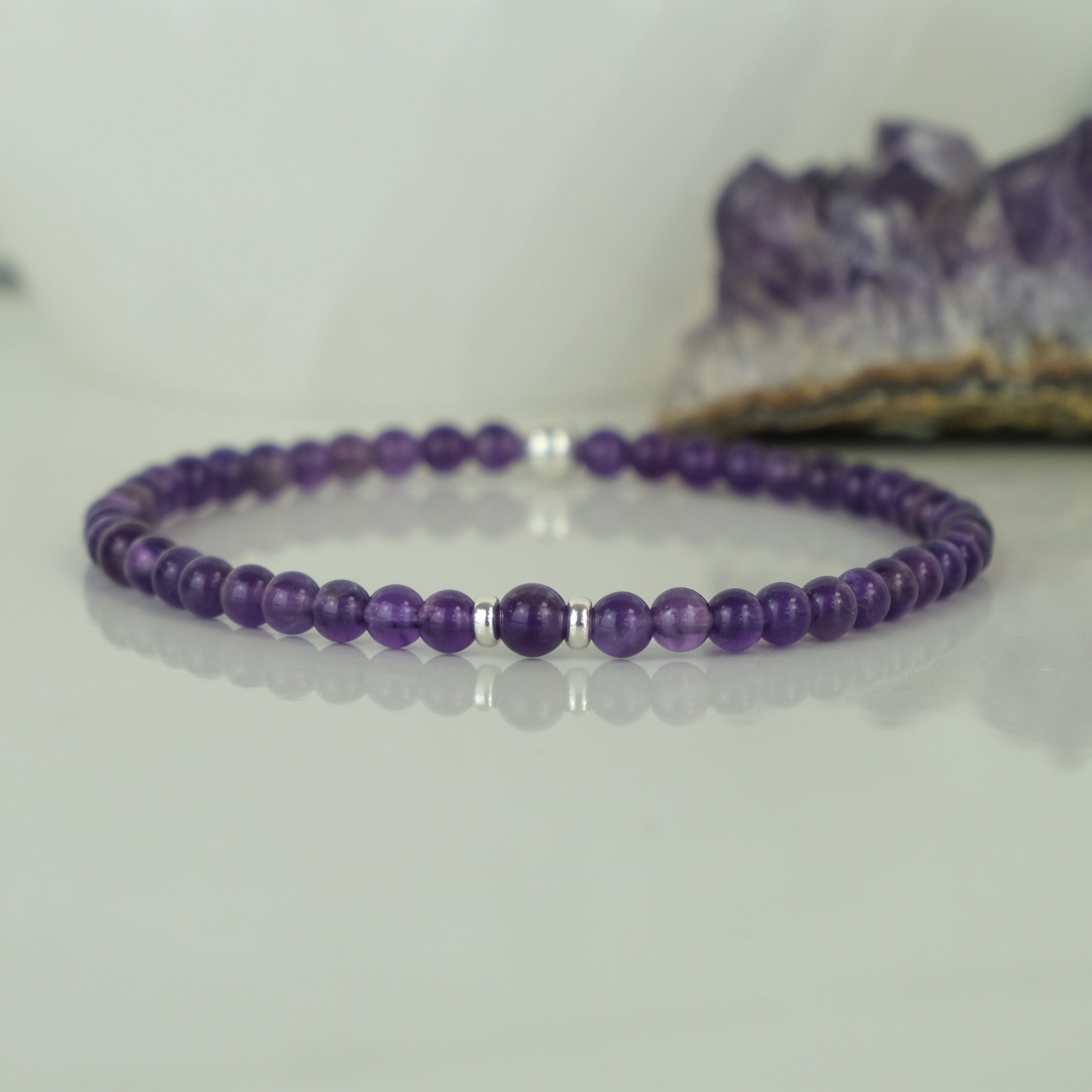 Amethyst gemstone bracelet in 4mm beads with silver accessories