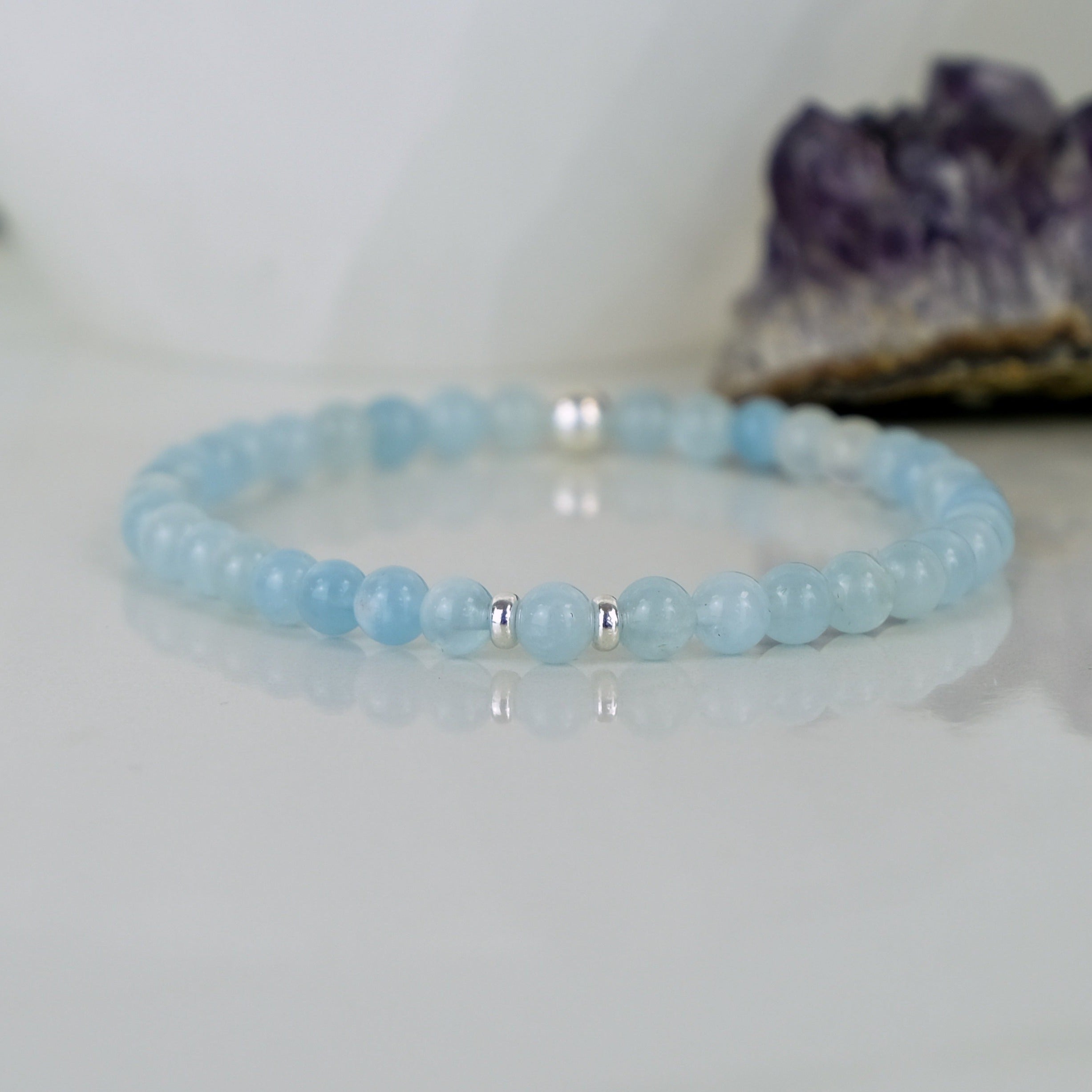 Aquamarine gemstone bracelet in 4mm beads with silver accessories