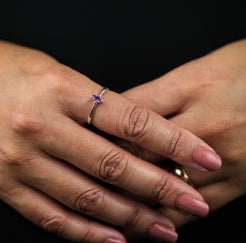 A model wearing Amethyst minimal marquis gemstone ring in silver