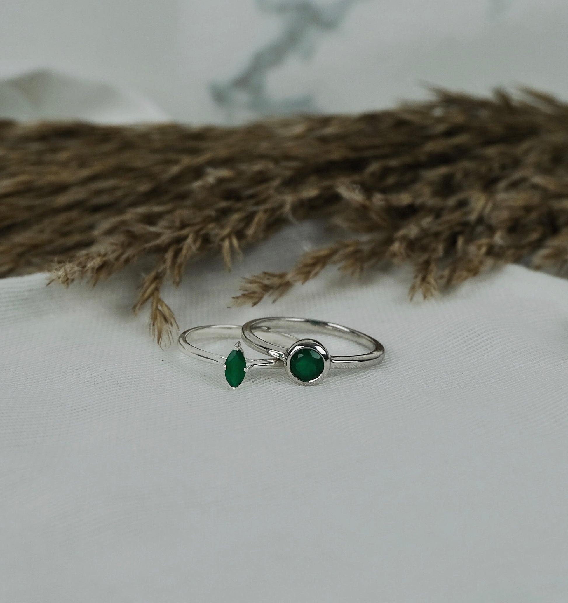Two green onyx gemstone rings