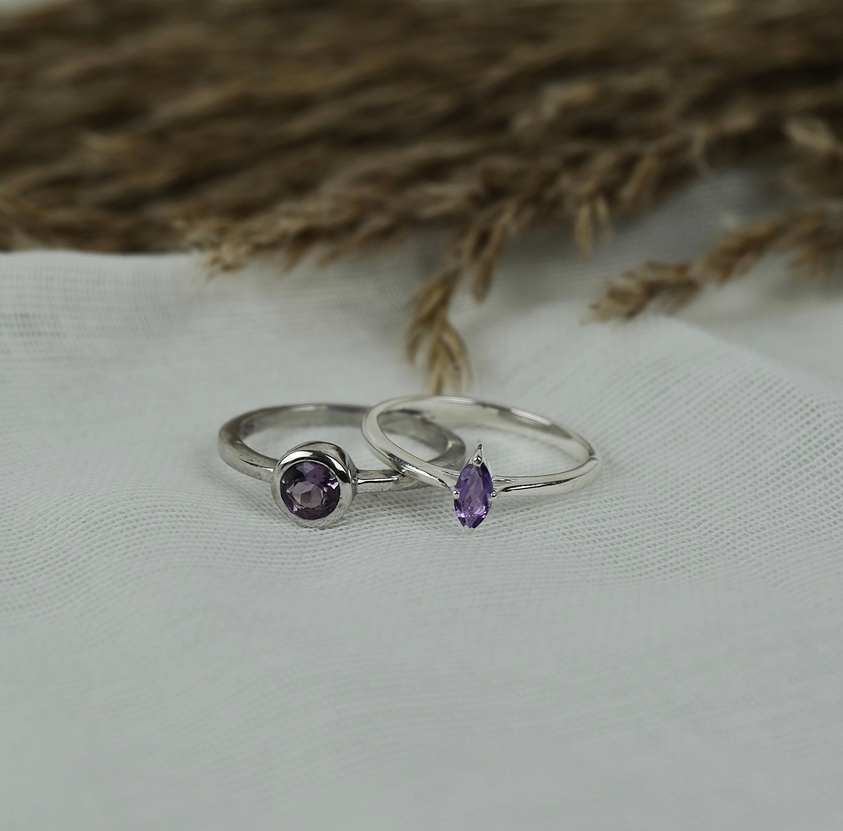 Two amethyst gemstone rings