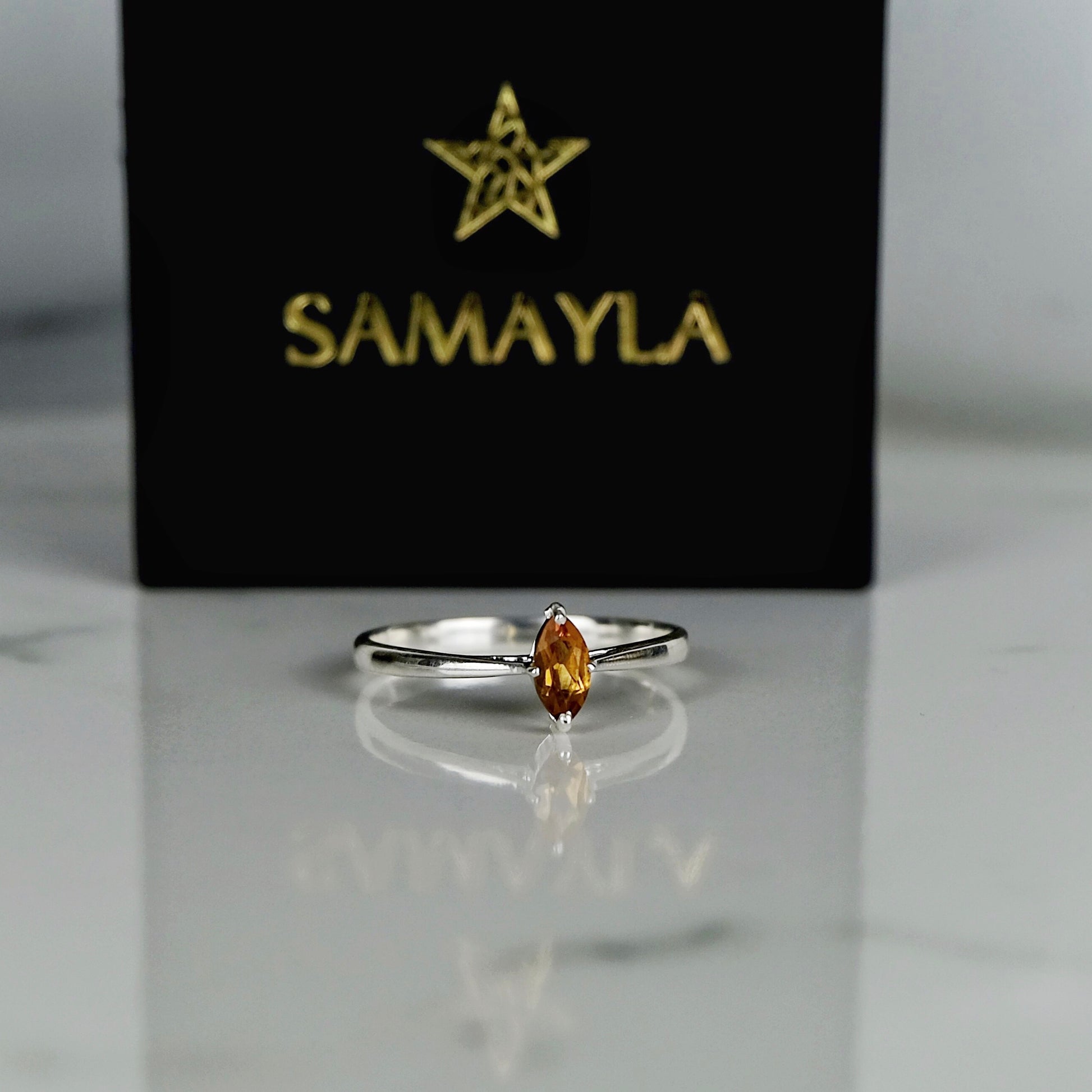Citrine gemstone ring in marquis setting