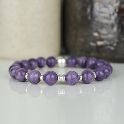A lepidolite gemstone bracelet with silver accessories