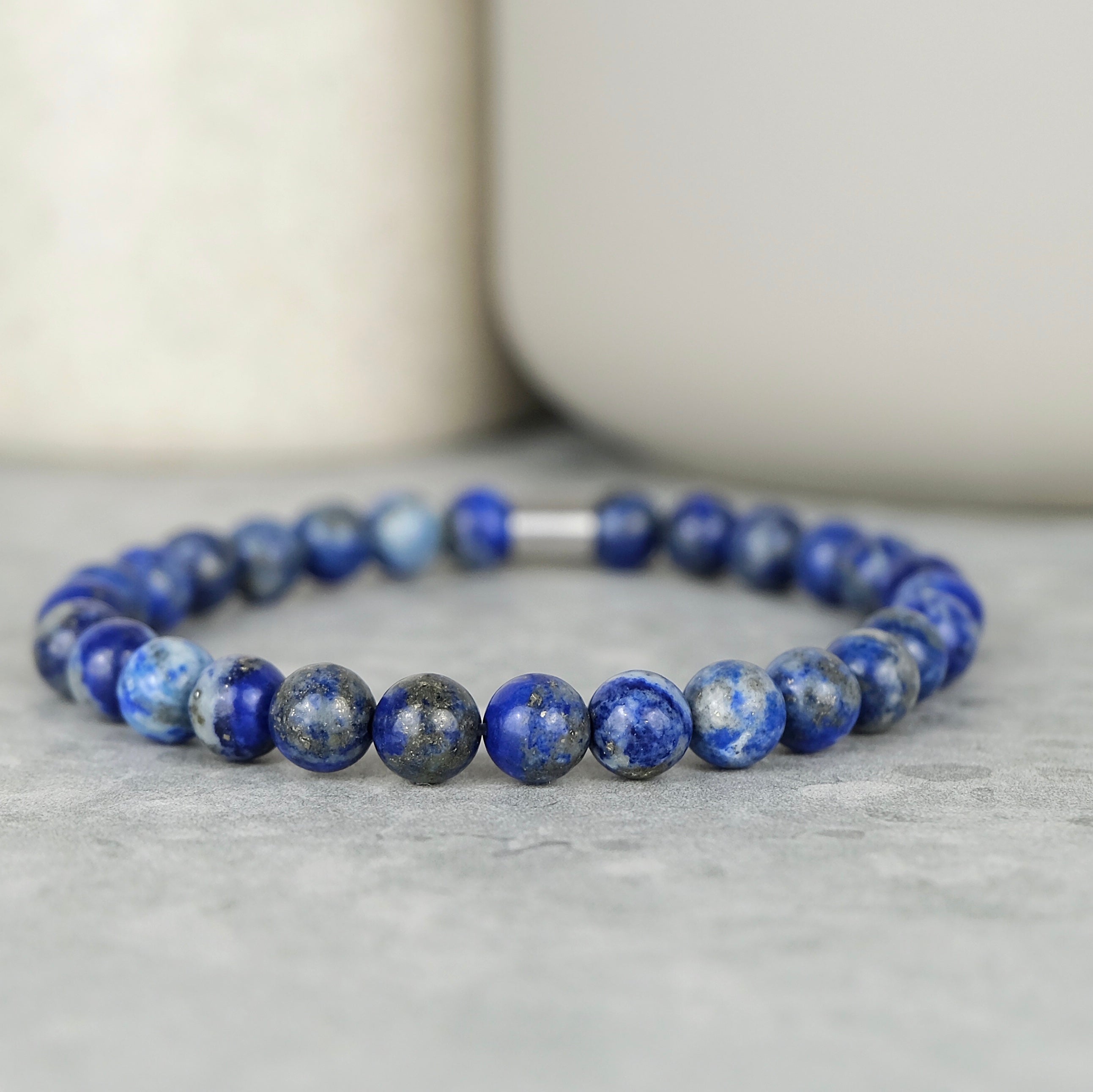 Lapis lazuli gemstone bracelet in 6mm beads with steel accessory