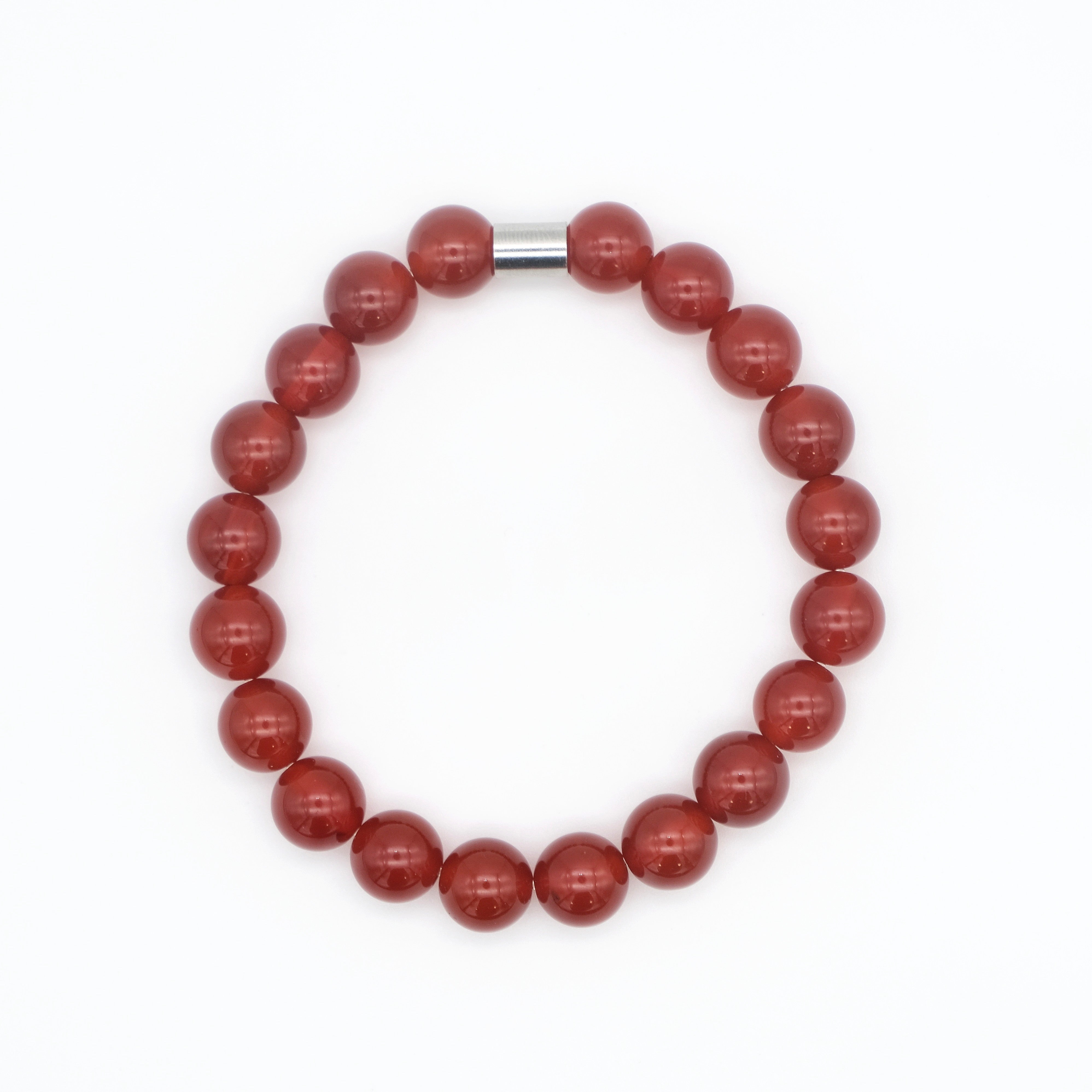 A carnelian gemstone bracelet in 10mm beads with stainless steel accessory from above