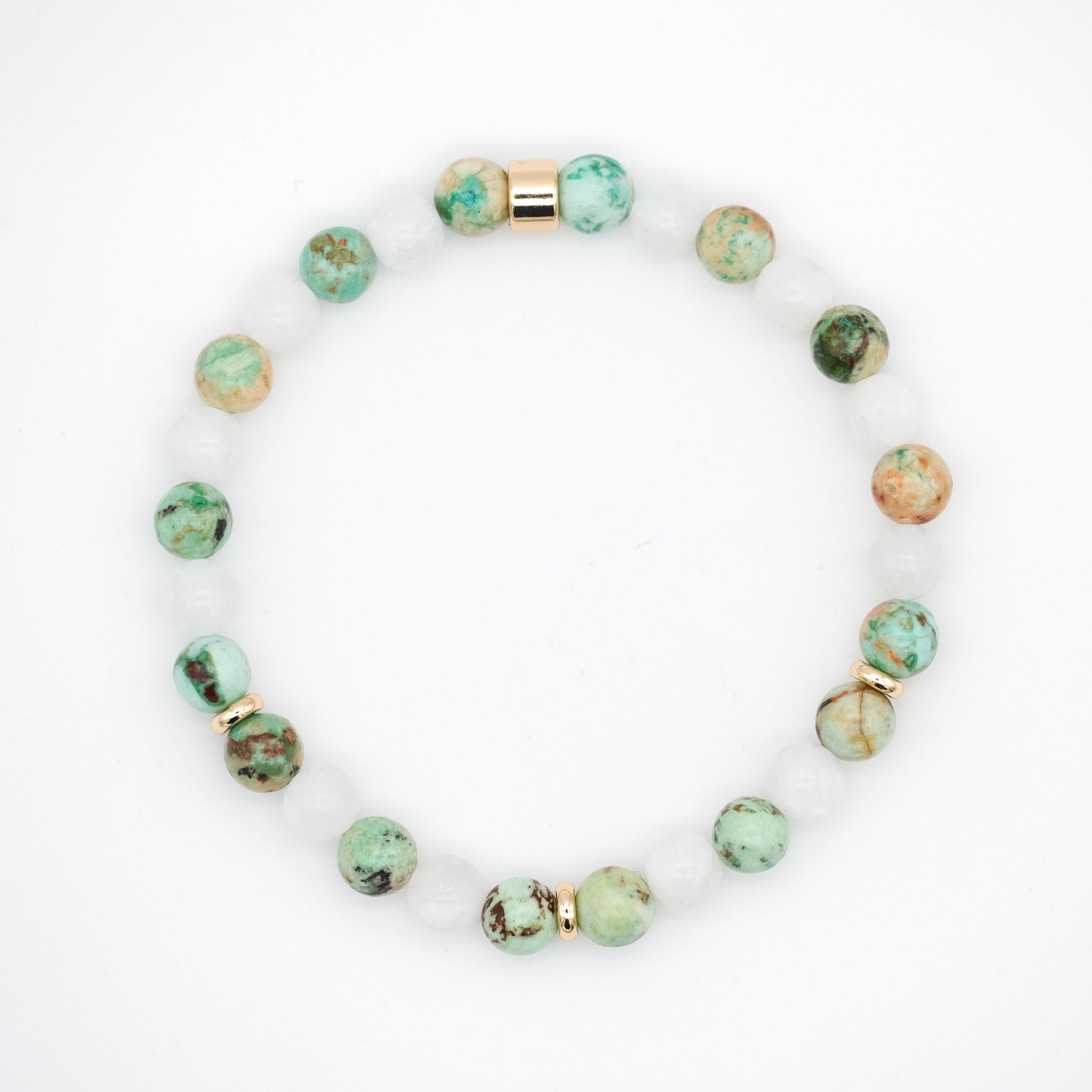 A moonstone and chrysocolla gemstone bracelet in 6mm beads with gold accessories from above