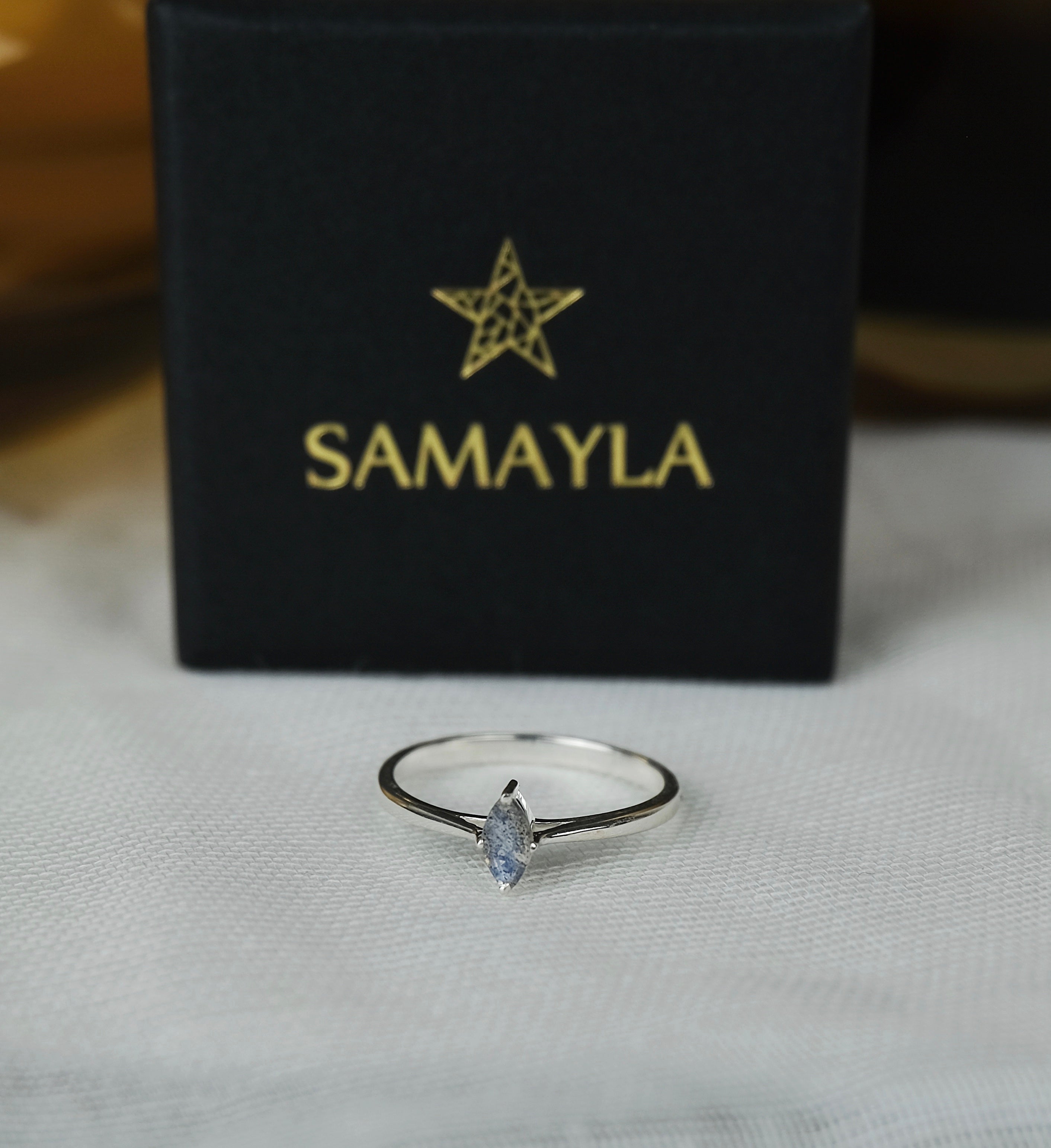 A labradorite minimal marquis gemstone ring in silver