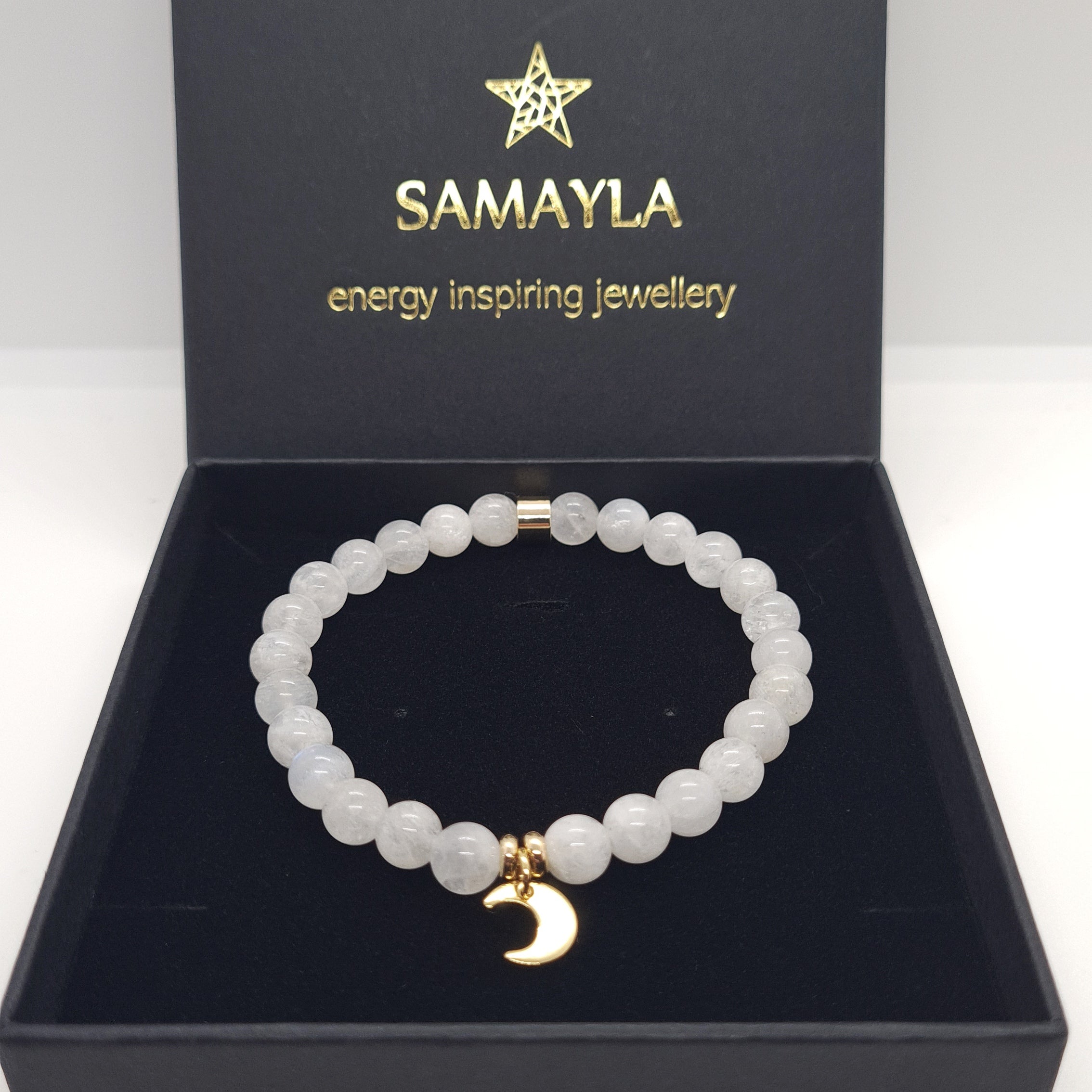 A moonstone gemstone bracelet in 6mm beads with moon charm in a Samayla Jewellery gift box