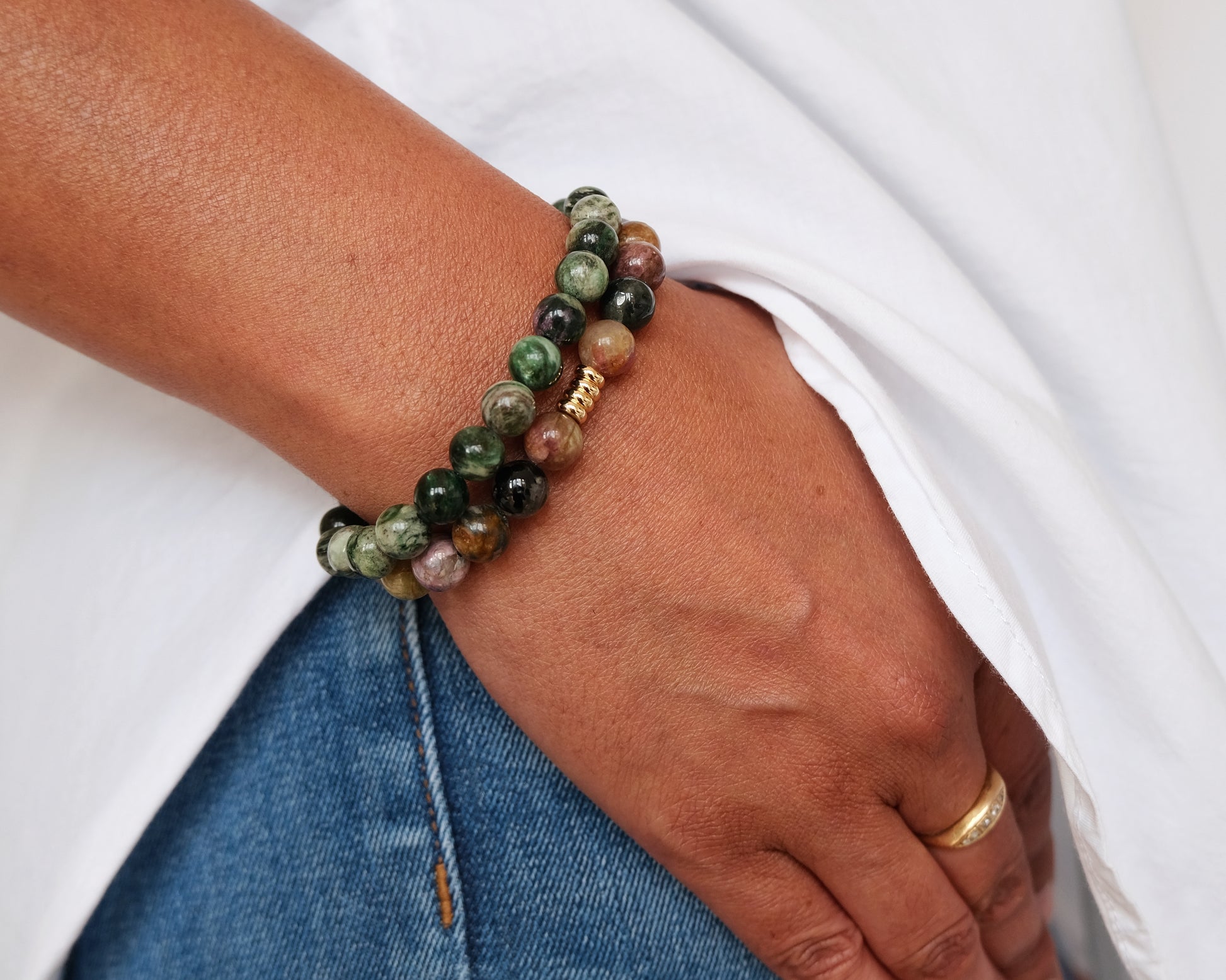 A model wearing a Green Lepidolite bracelet