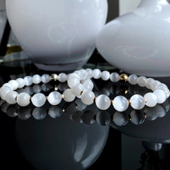 Two Selenite semi-precious beaded gemstone bracelets with gold and silver accents