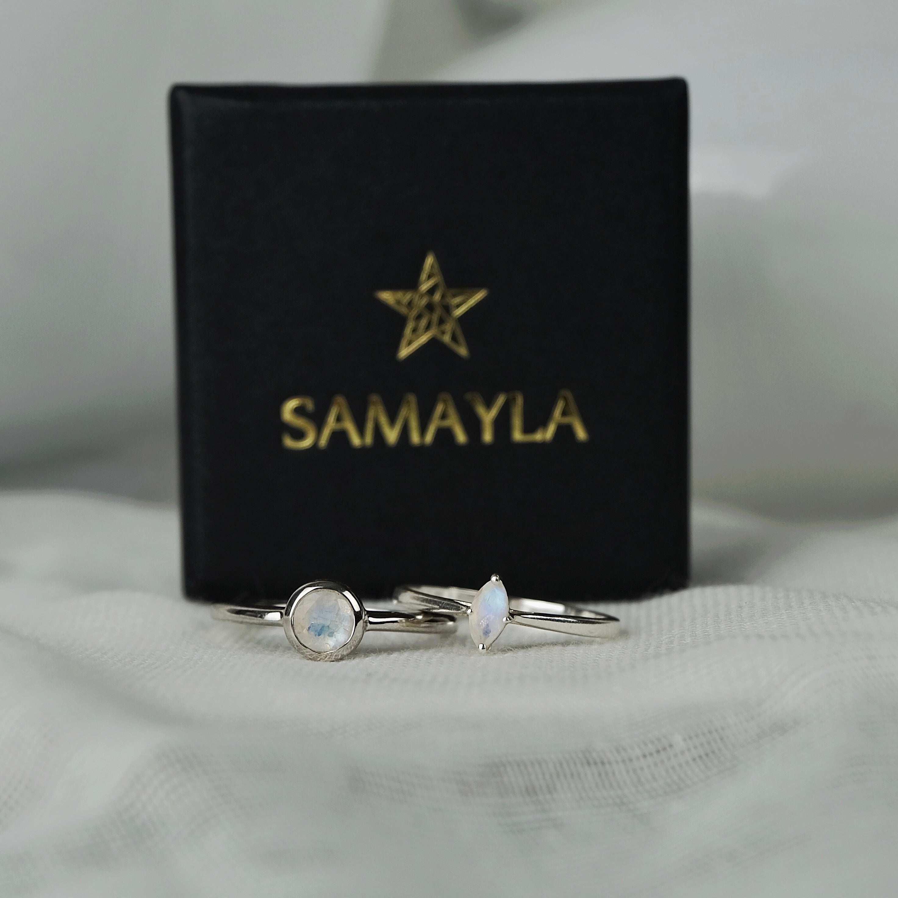 Two moonstone gemstone rings