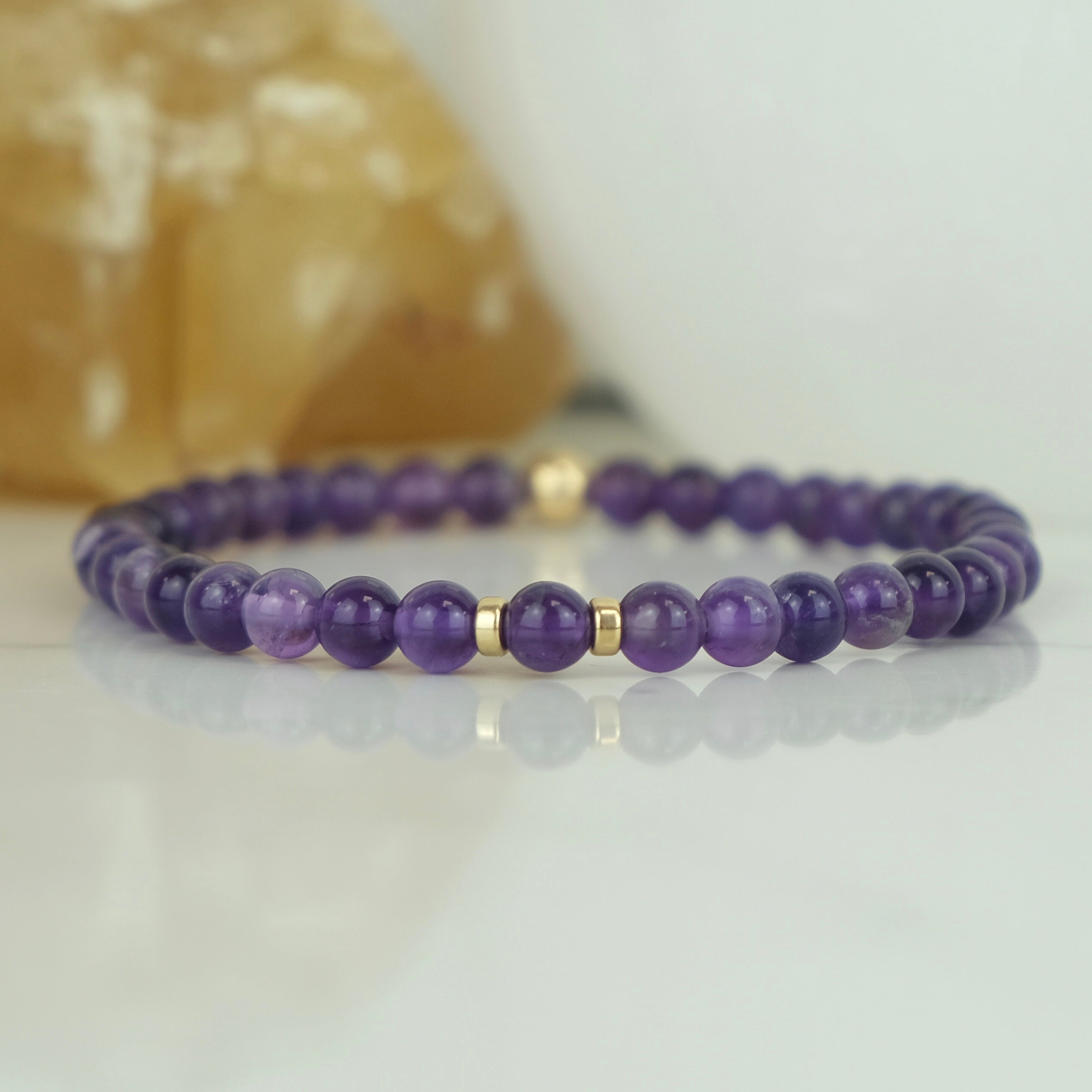 Amethyst gemstone bracelet in 4mm beads with gold filled accessories