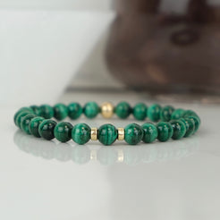 A malachite gemstone bracelet with 14ct gold filled accessories