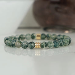 Moss agate gemstone bracelet in 6mm beads with gold accessories